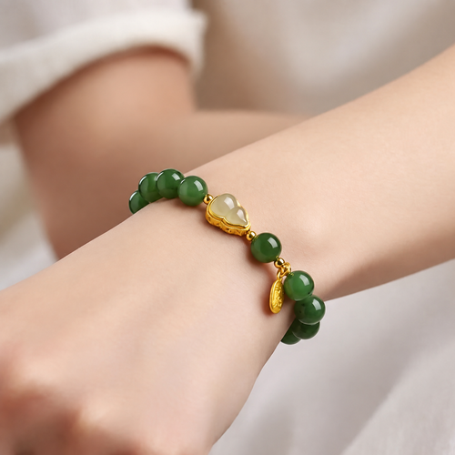 Mira green bead bracelet worn on wrist